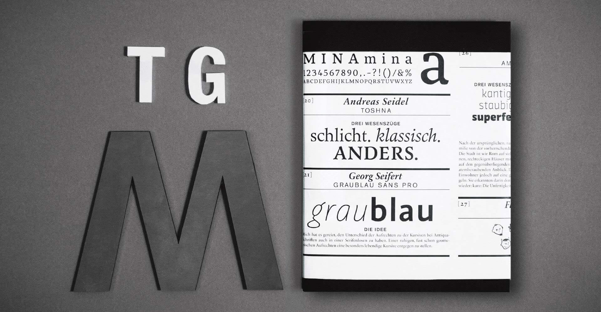 Typografische Gesellschaft München Corporate Book auf grauem Hintergrund mit viel Typografie und den Buchstaben TGM neben dem Buch